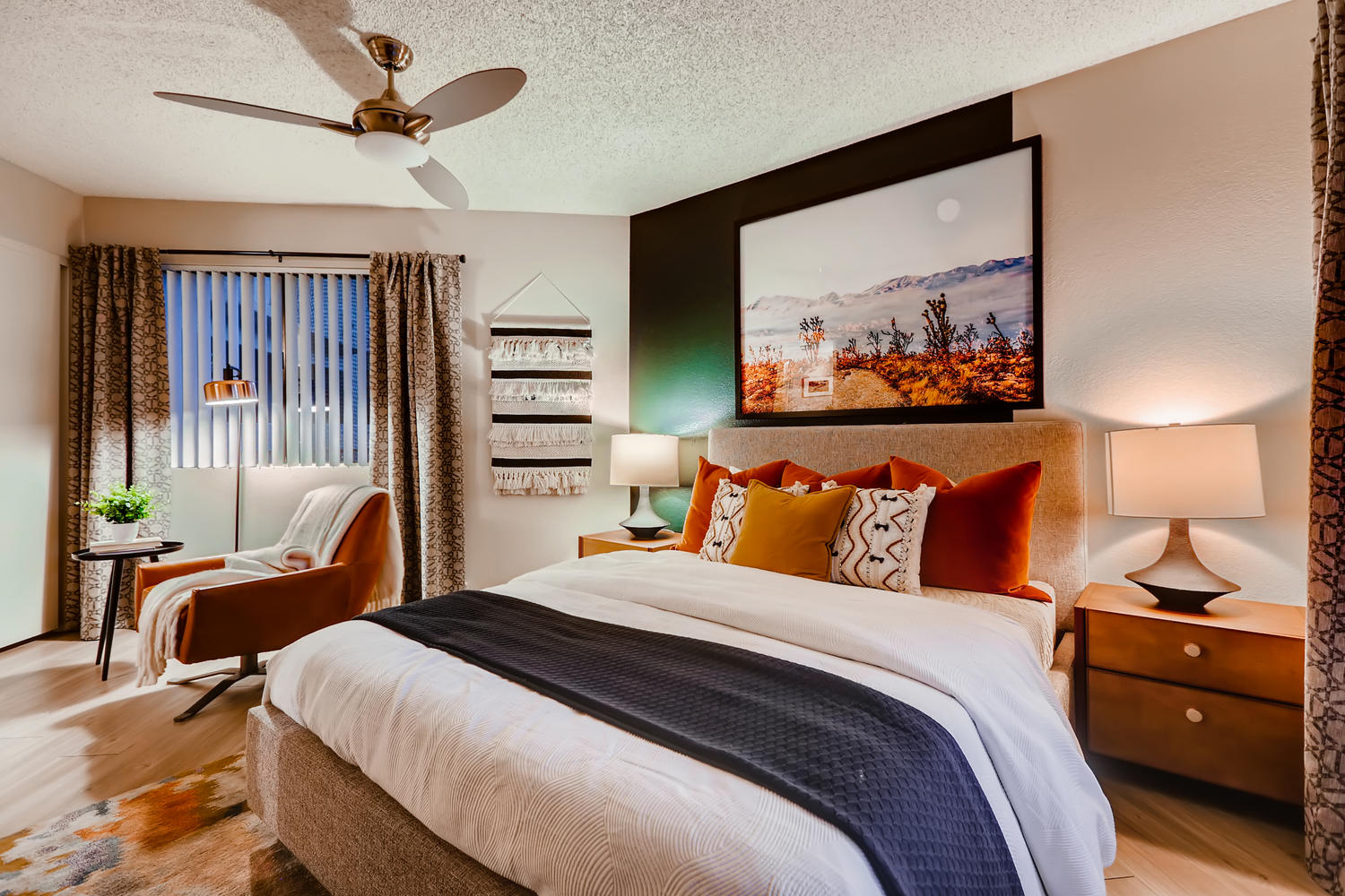 bedroom view with beautiful brown and neutral decor and window